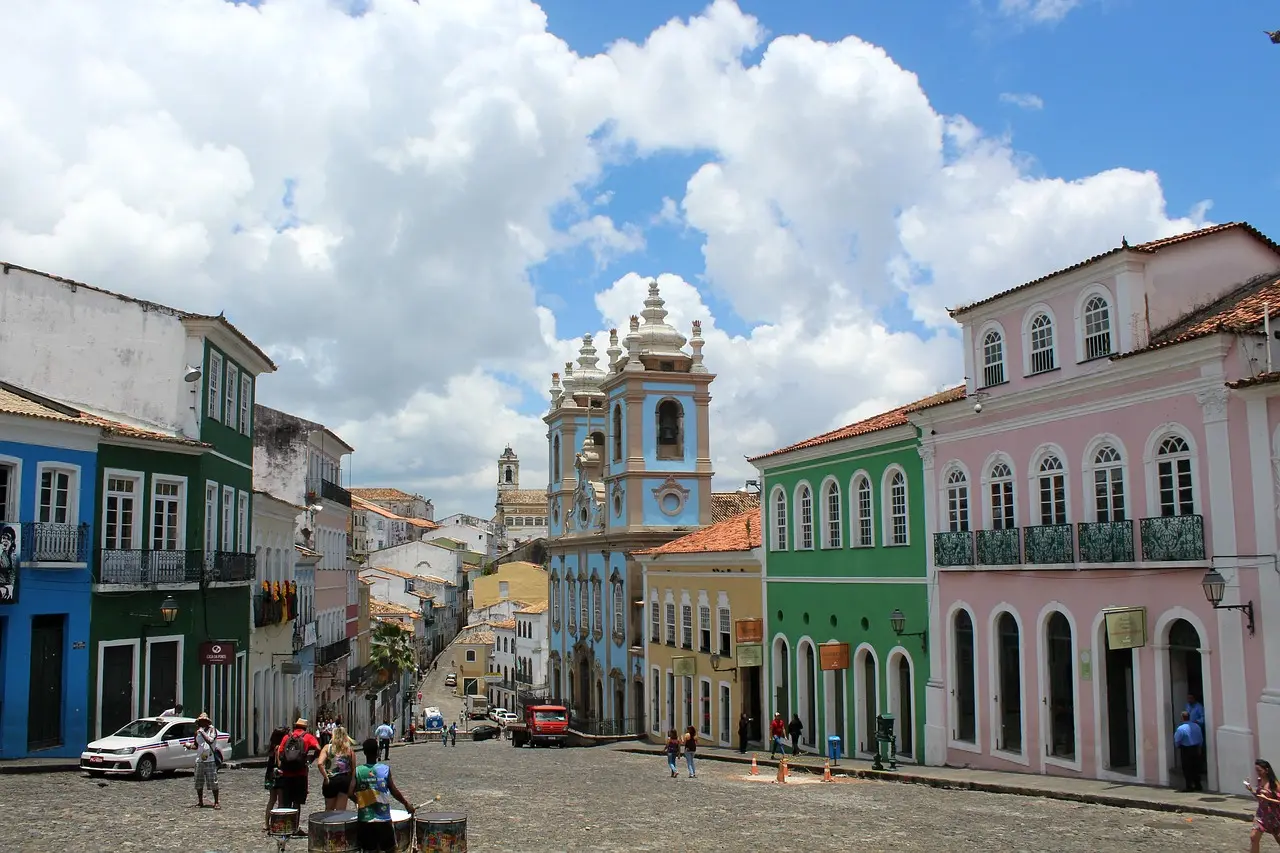Vibrant colonial buildings with pastel facades and ornate ironwork lining cobblestone streets in Pelourinho, Salvador — Brazil’s oldest Afro-Brazilian cultural heart Colorful colonial buildings and cobblestone streets in Pelourinho, Salvador, Bahia