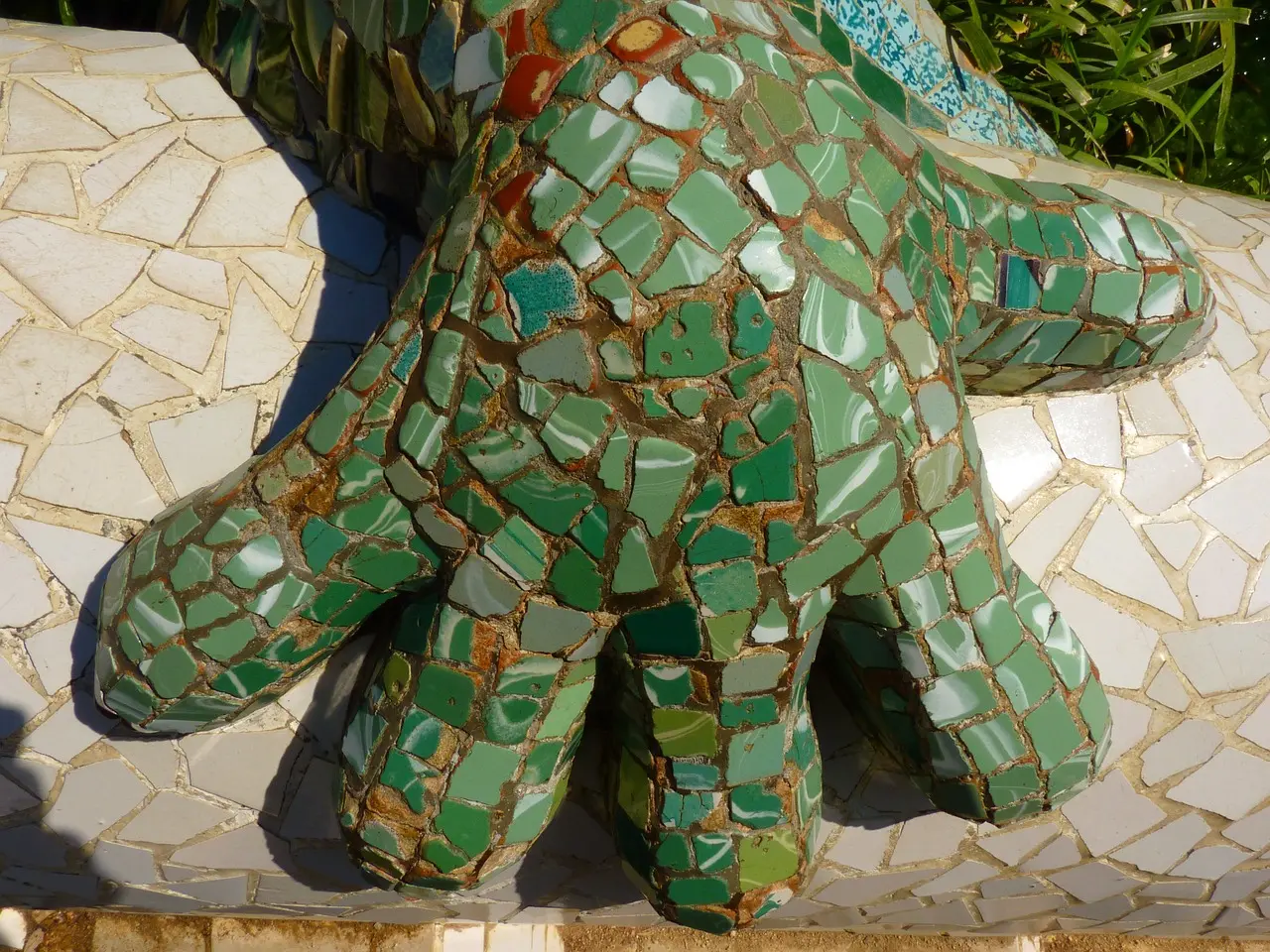 The legendary mosaic dragon at Park Güell — a joyful, symbolic centerpiece reflecting Gaudí’s imagination and Barcelona’s artistic soul among must-visit places in Spain. Colorful mosaic dragon fountain at Park Güell in Barcelona