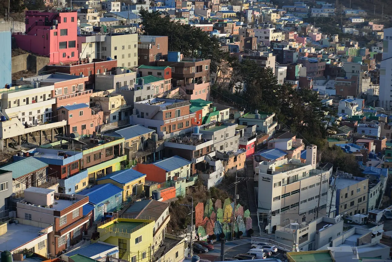 Vibrant rainbow staircases and painted homes in Gamcheon Culture Village — a joyful, artistic highlight among must-visit places in Korea Rainbow-colored houses and winding staircases in Gamcheon Culture Village, Busan