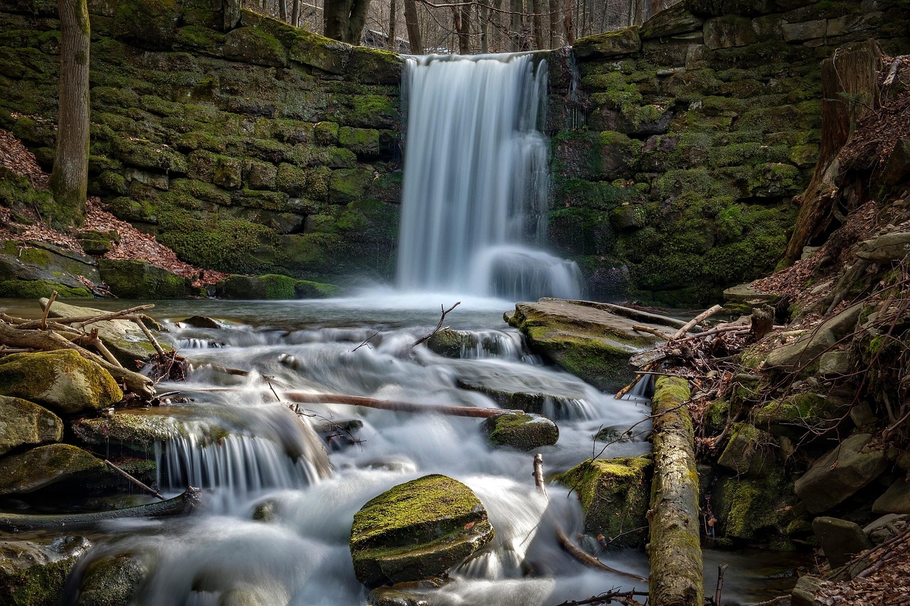 Mist-shrouded Triberg Waterfalls tumbling over ancient volcanic rock in Germany’s legendary Black Forest — a nature-rich highlight among the 15 must-visit places in Germany. Triberg Waterfalls cascading down mossy cliffs in the Black Forest