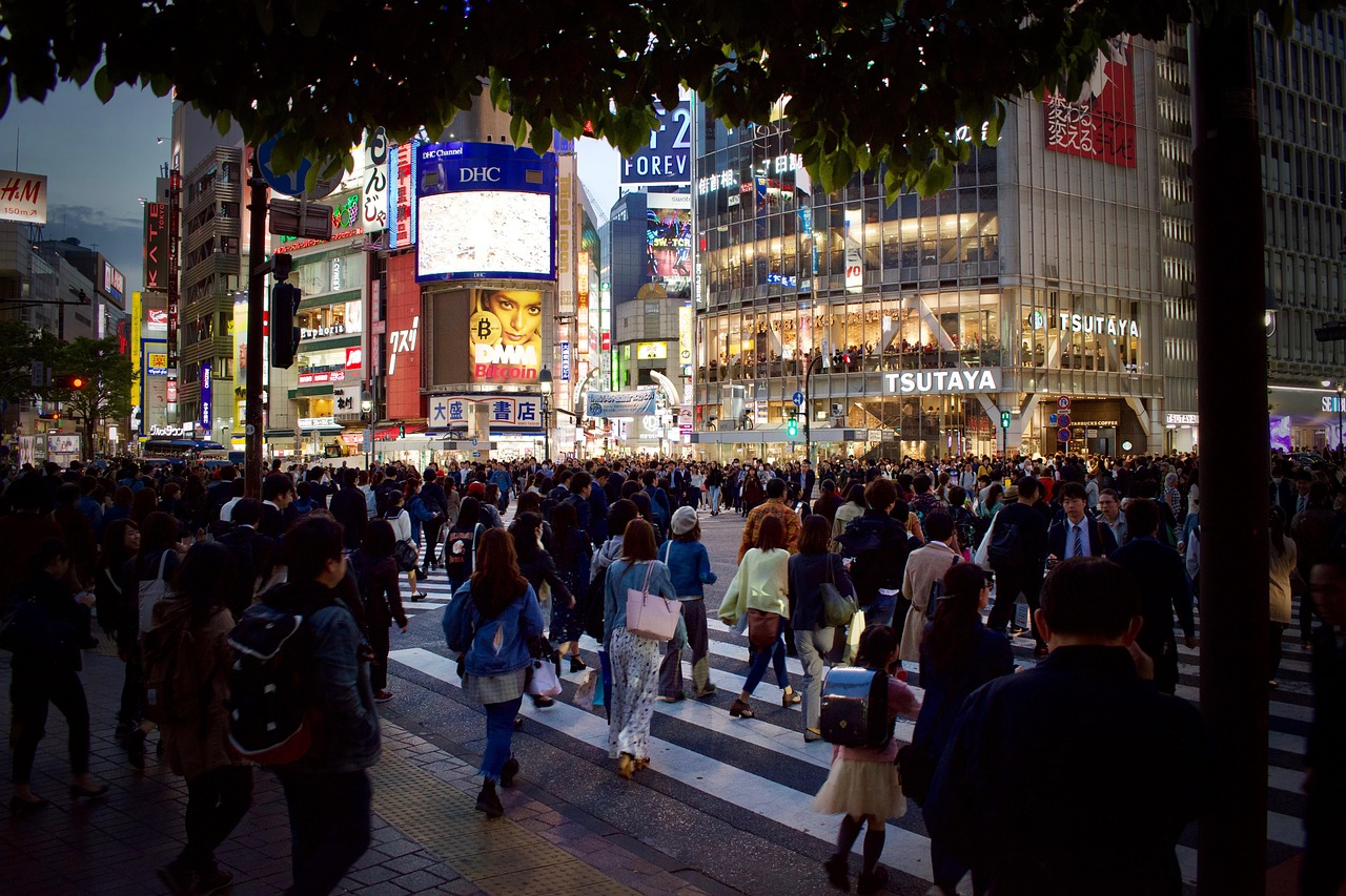 Shibuya Crossing at night — the world’s busiest pedestrian intersection and a defining symbol of Tokyo’s electric energy among the top places to visit in Japan Shibuya Crossing at night with neon signs, crowds, and towering digital billboards in Tokyo