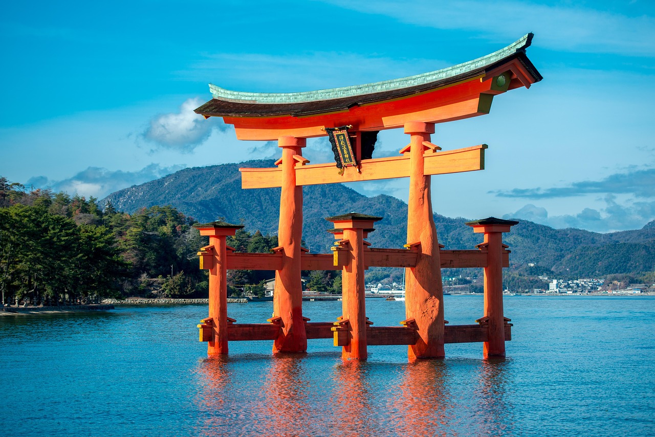 The legendary 'floating' torii gate of Itsukushima Shrine on Miyajima Island — a serene, spiritually rich addition to any itinerary of places to visit in Japan Itsukushima Shrine's iconic red torii gate rising from the sea at low tide on Miyajima Island