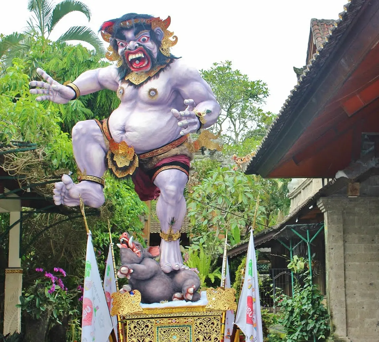 Ogoh-Ogoh procession in Ubud, Bali — a dramatic prelude to Nyepi, exemplifying cultural experience through local festivals and folk performances Large, intricately crafted Ogoh-Ogoh demon figure carried by young men during Balinese night parade